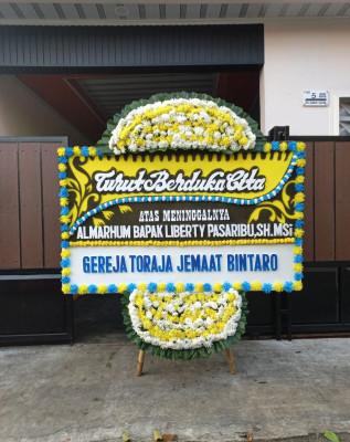 Papan Bunga Duka di Moga